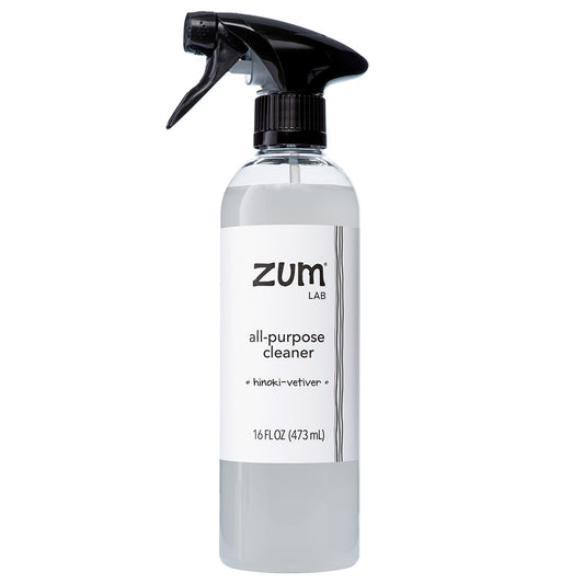 A 16 FL.OZ clear plastic spray bottle of Zum Lab All Purpose Cleaner with a black trigger spray top and a white label, shown on a solid white background.