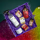 Collection of Zum products including bottles and containers on a colorful textured surface.