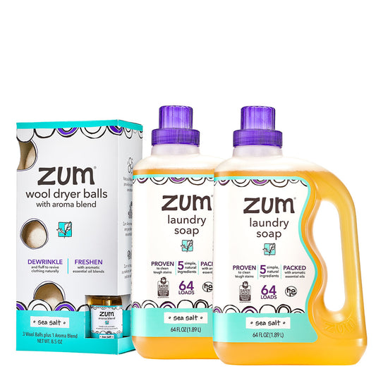 Zum laundry soap bottles and wool dryer balls packaging on a white background