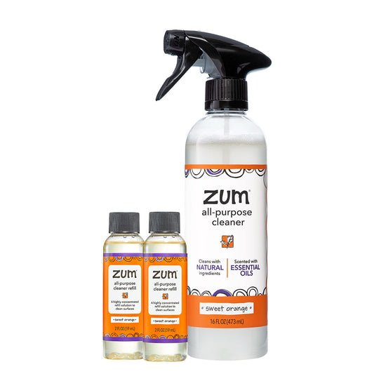 Sweet Orange Zum all-purpose cleaner set with a spray bottle and two smaller bottles on a white background