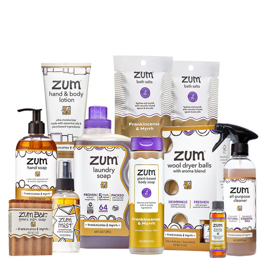 Collection of Frankincense & Myrrh home and body care products on white background.