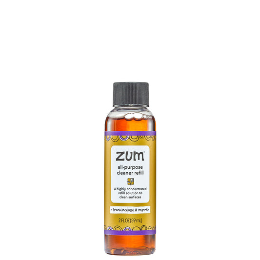Frankincense & Myrrh refill in a clear bottle with black cap and brown label.
