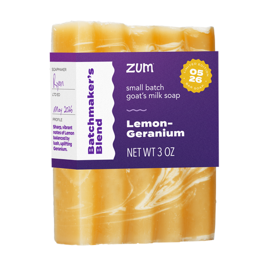 Lemon-Geranium Bar Soap, colored yellow with swirls of white.