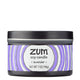 Side view 7 oz Lavender Candle in a black tin with light purple and white label that has circular designs.