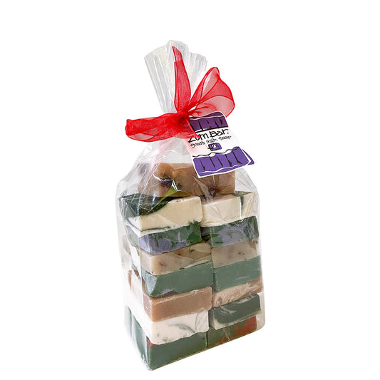 Clear bag filled with a pound of mini Zum Bar end cuts in a variety of colors and scents.