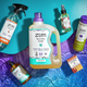Collection of Zum laundry products on a blue and purple gradient background