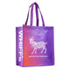 Zum recyclable tote bag at an angle. Goat and the slogan 'Amp Up Your Ordinary.' in the front on an orange to purple gradient. Side of the tote says 'Good Whiffs' on purple background.