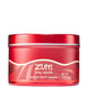 Red candle tin with peppermint-vanilla wavy label wrapped around base.