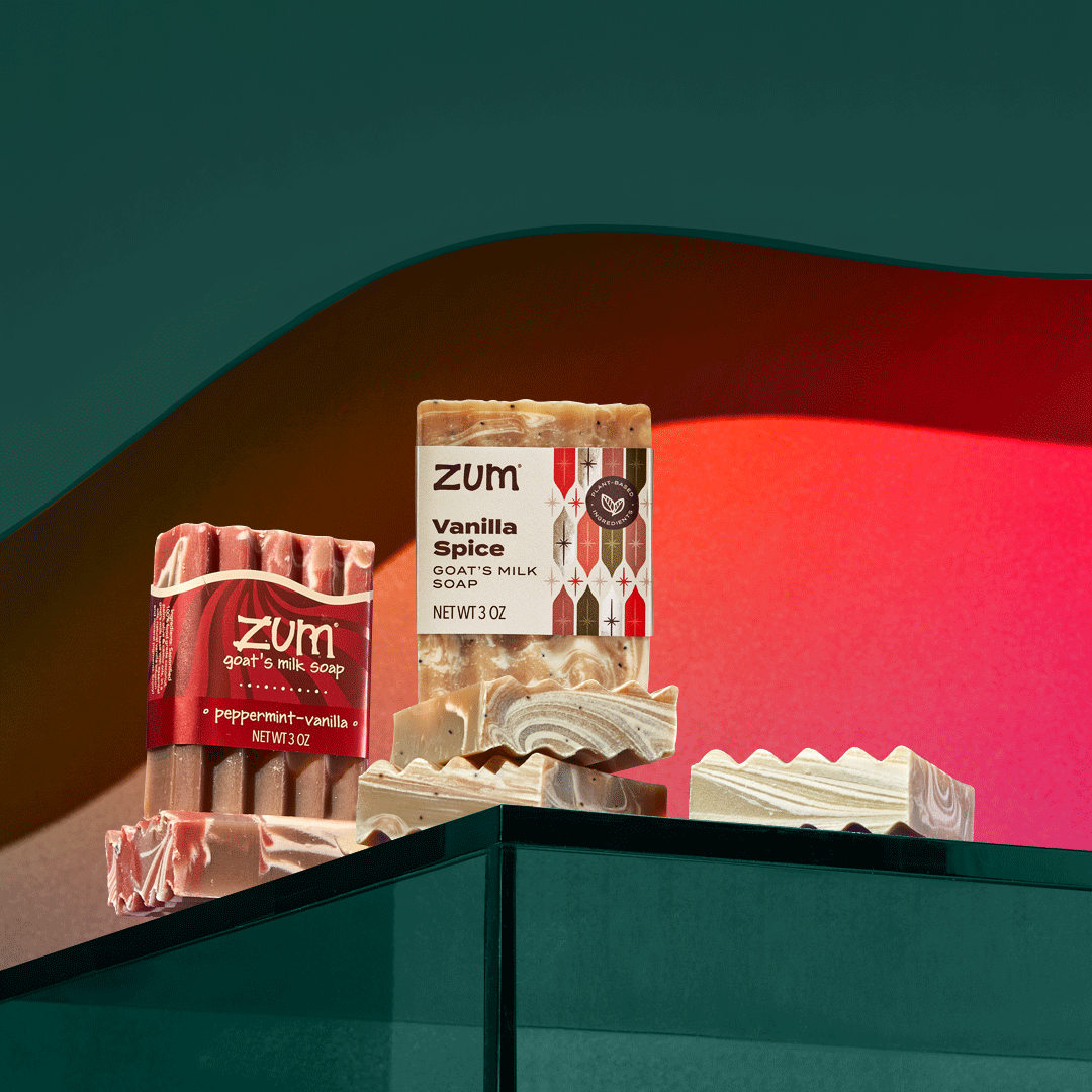 Three Holiday Zum Bar Soaps sitting on green shelf