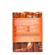 Back of red, orange, and white swirled Bar Soap with orange label wrapped around the middle.
