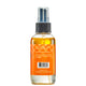 Back of Spiced Citrus Mist in a clear bottle with black spray top cap.