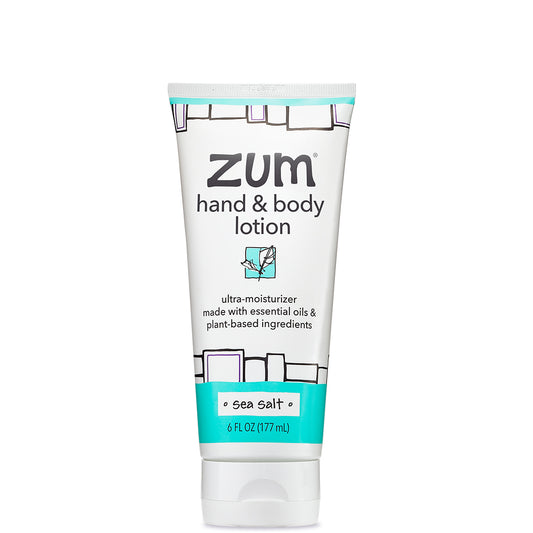 White tube with black and blue design containing sea salt scented body lotion.