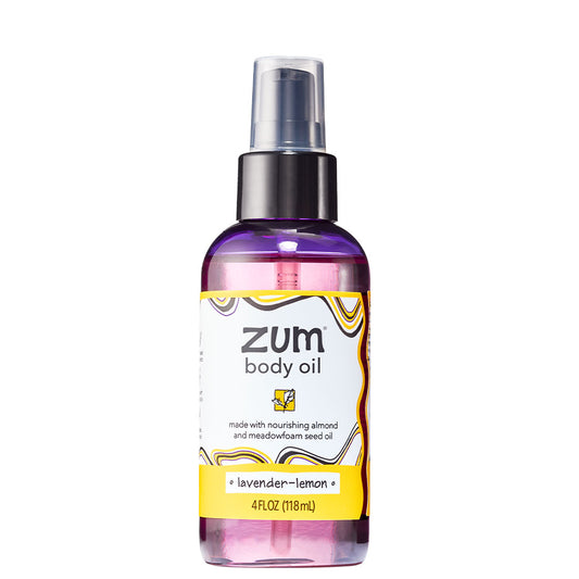 Cylinder bottle with pump top and cap that contains lavender-lemon scented body oil