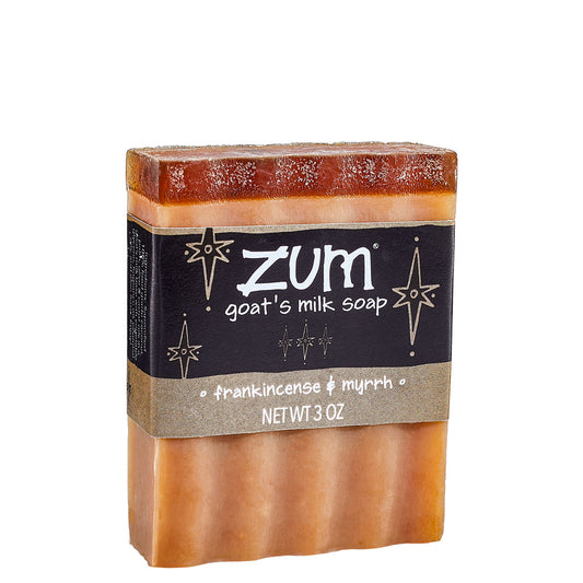 Brown Frankincense & Myrhh Zum Bar with layer of glycerin at the top. Labeled with a black, holiday themed label.