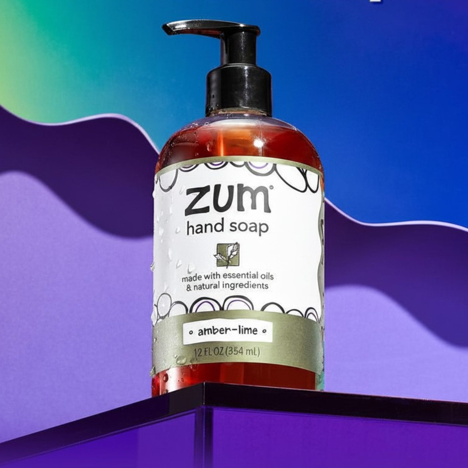 Zum hand soap bottle with pump on a colorful background
