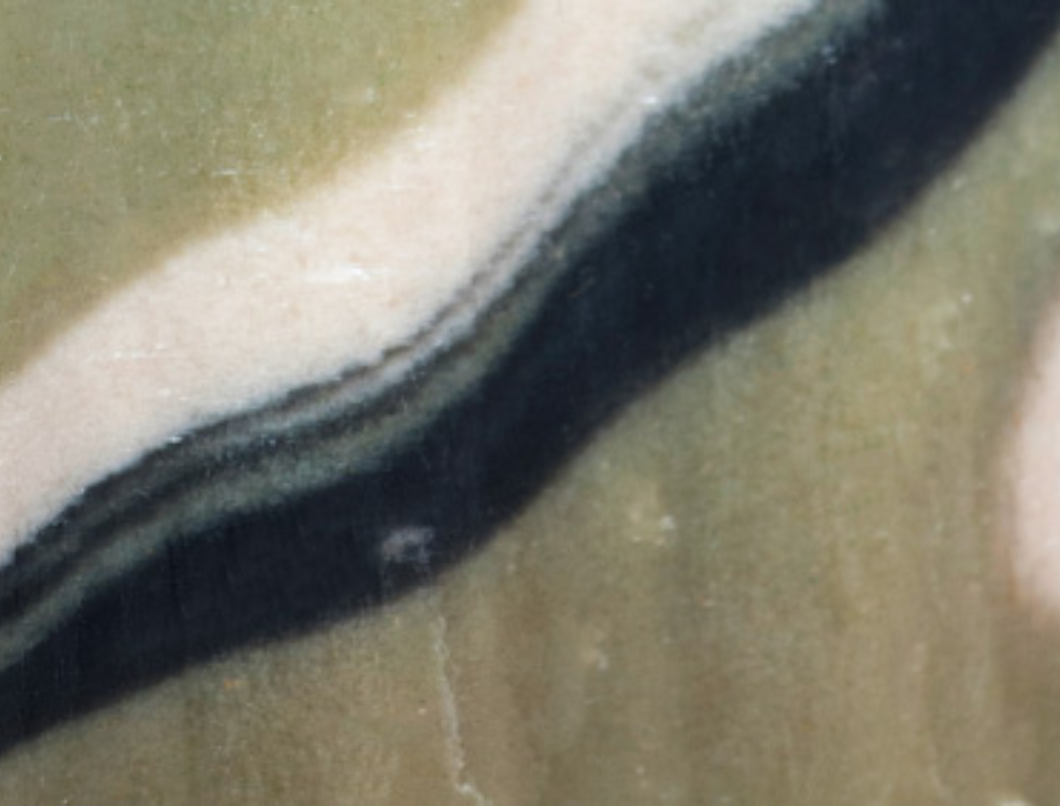 Close-up of Zum Goat Milk Bar in Amber-Lime Scent.