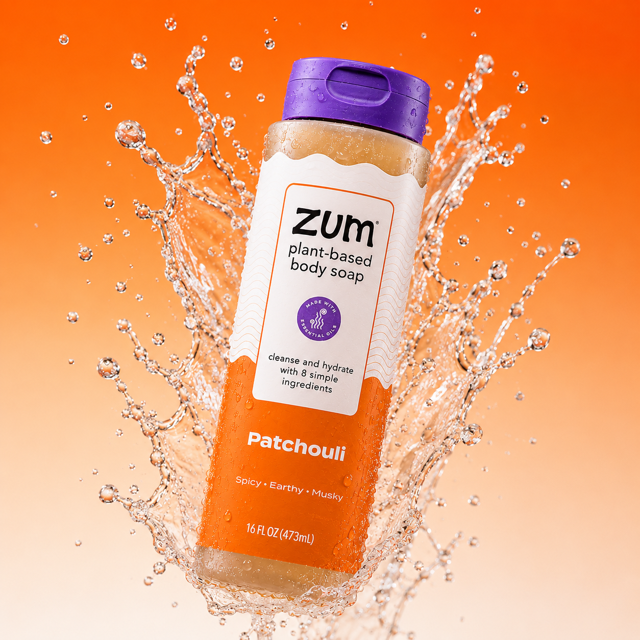 A bottle of Zum Plant-Based Body Soap, Patchouli scent, floating amidst a dynamic water splash against a vibrant orange gradient background.
