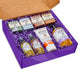 Large purple gift box filled with crinkle and assorted Zum products in assorted aroma blends.