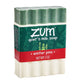 Front Shot of Zum Winter Pine Goat's Milk Soap. White Bar with green streak at top with label.