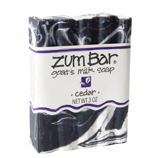 Labeled Cedar scented Zum Bar Soap with white and black colored swirls.