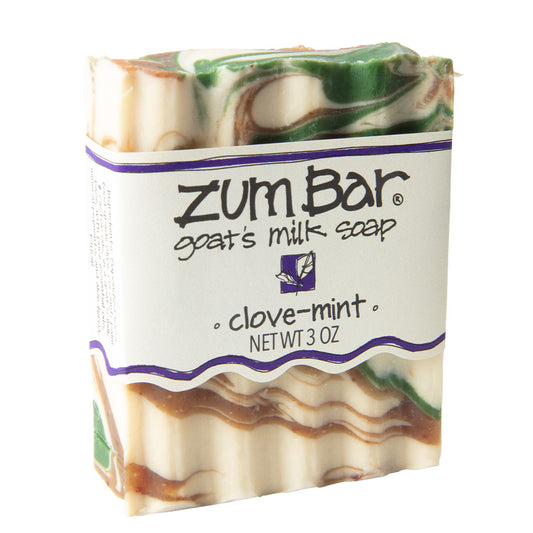Labeled Clove-Mint scented Zum Bar Soap with cream, brown and green colored swirls.