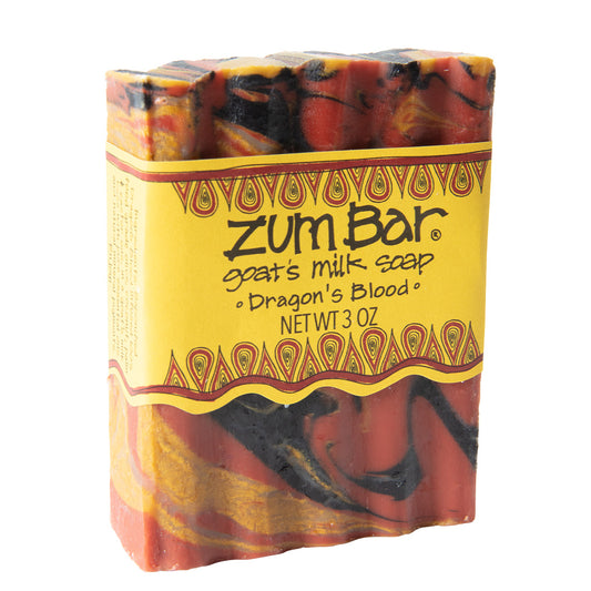 Labeled Dragon's Blood infused Zum Bar Soap with red, yellow and black colored swirls.