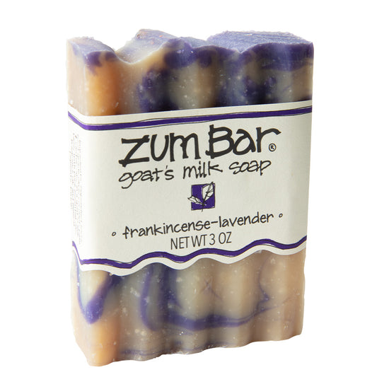 Labeled Frankincense-Lavender scented Zum Bar Soap with brown and purple colored swirls.