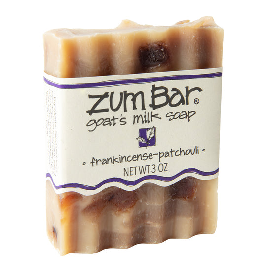 Labeled Frankincense-Patchouli scented Zum Bar Soap with varied brown coloring