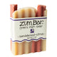 Labeled sandalwood-citrus scented Zum Bar Soap with cream and red coloring