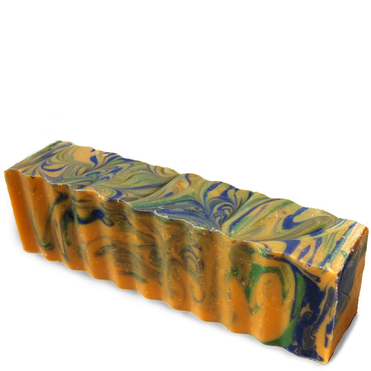 Rectangular yellow, green and blue wavy 45 ounce brick of Citrus-Mint scented Zum Bar Soap