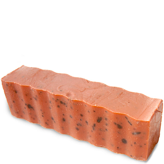 Speckled orange colored wavy rectangular 45 ounce brick of patchouli and orange scented Zum Bar Soap