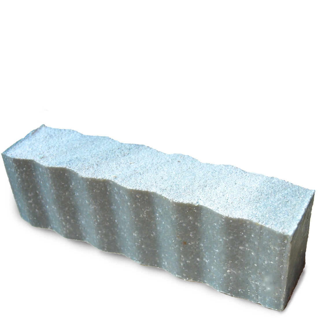 Light blue colored  and speckled with sea salt wavy rectangular 45 ounce brick of citrus scented Zum Bar Soap