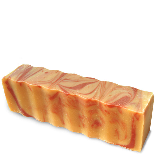 Orange and red swirly colored wavy rectangular 45 ounce brick of tangerine and orange scented Zum Bar Soap
