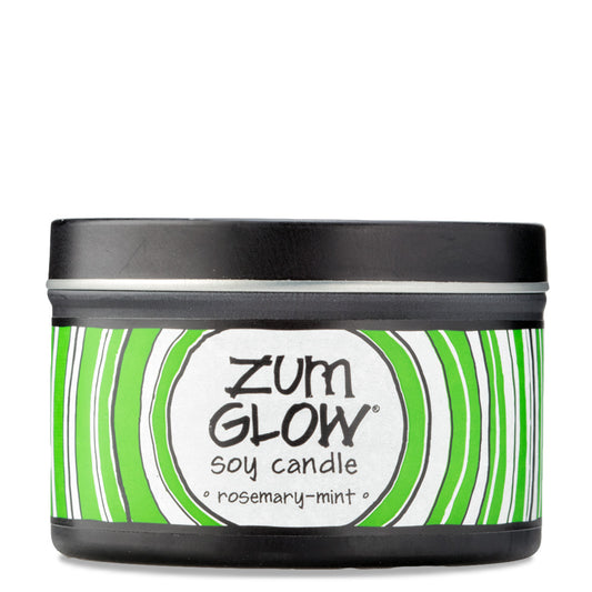 Side view 7 oz Rosemary-Mint Candle in a black tin with green and white label that has circular designs.